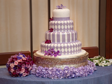 Allison carried the purple theme through to her wedding cake made by Cake 